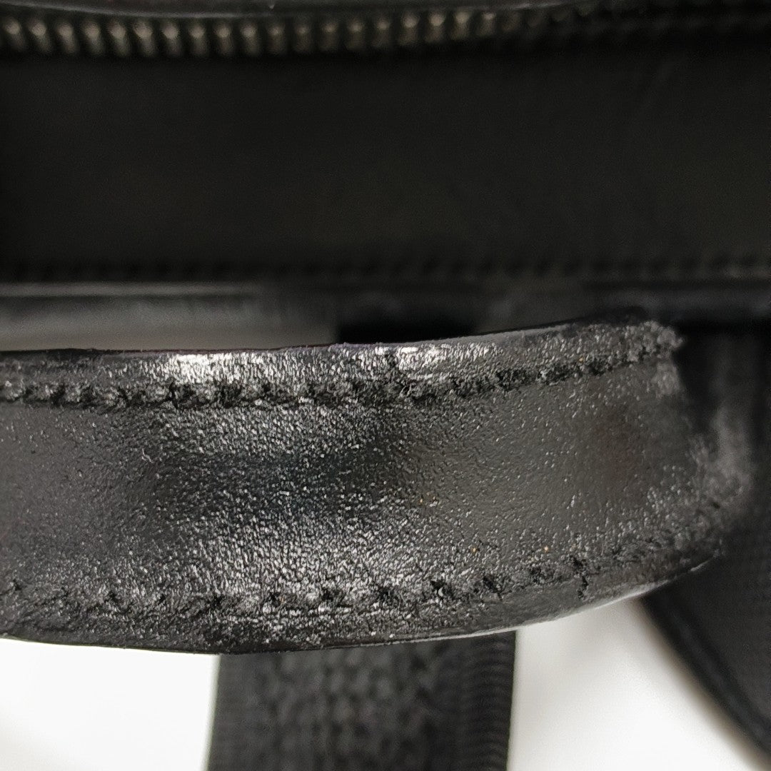 Monogram Coated Canvas Backpack Black