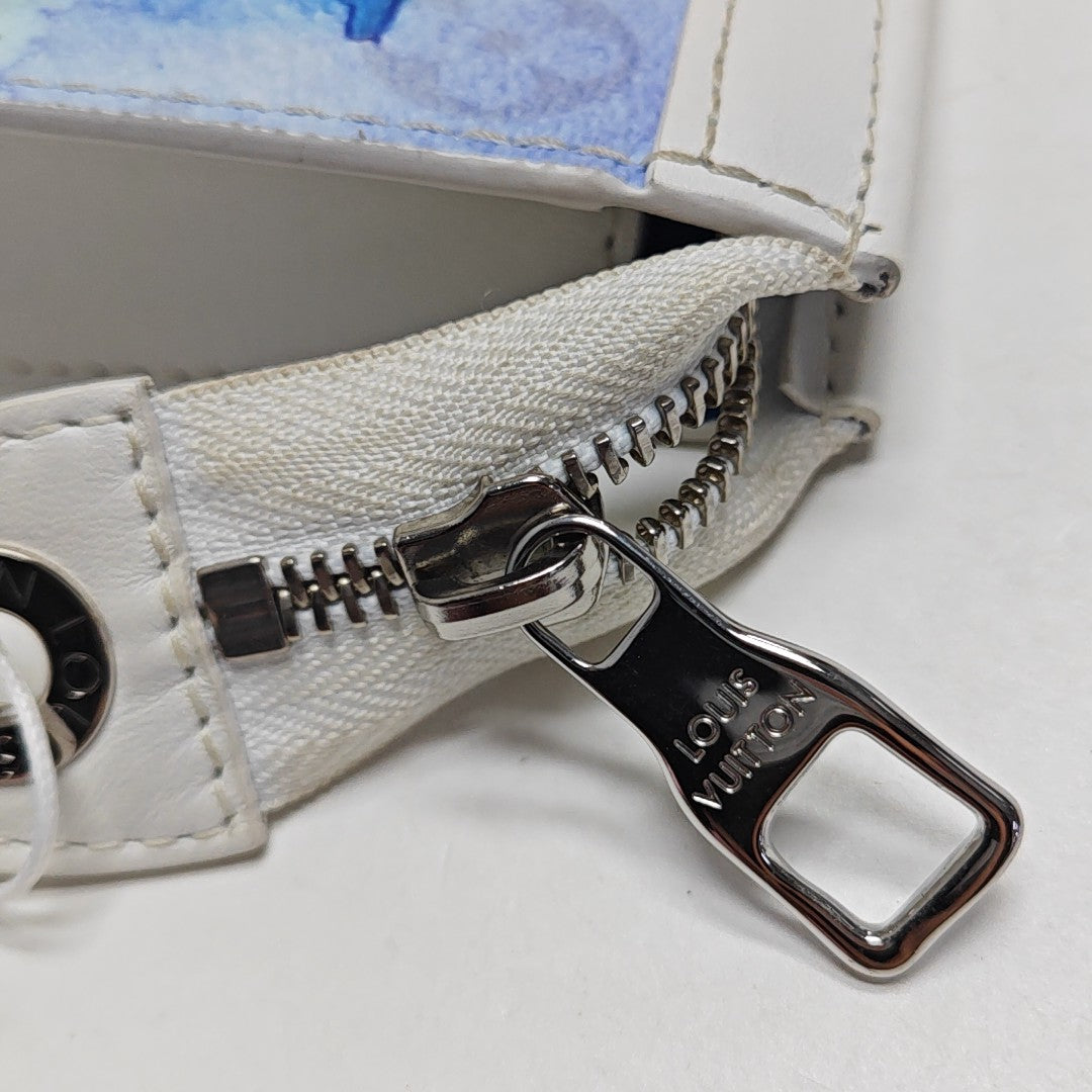 Pochette Voyag MM Monogram Coated Canvas White