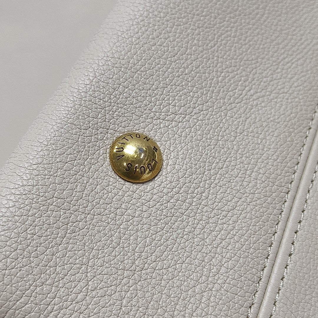 LOW KEY HOBO MM Monogram Calfskin Beige