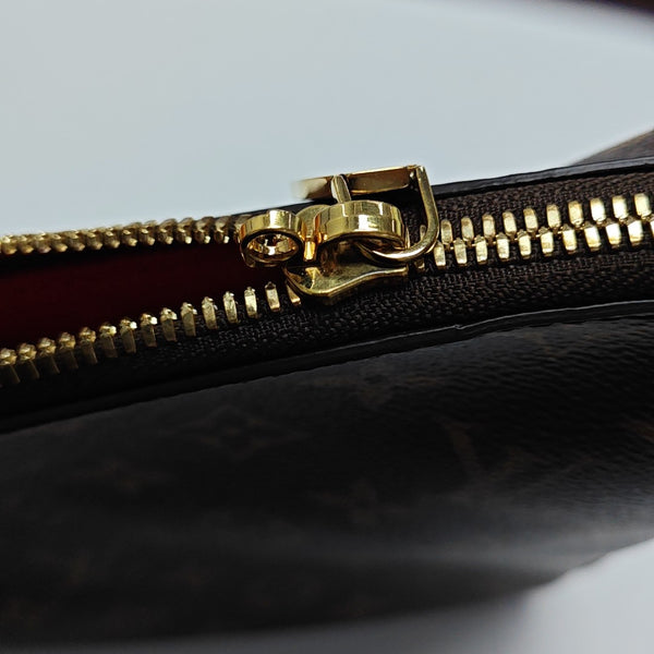 SLOUCHY PM Monogram Coated Canvas Brown