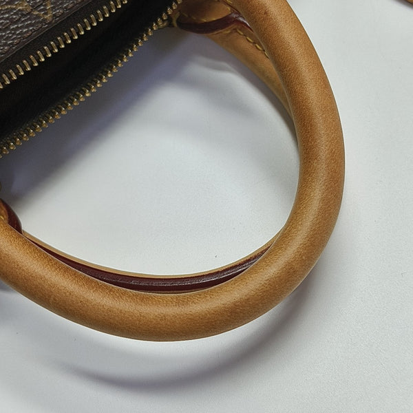 SPEEDY 25 Monogram Coated Canvas Brown