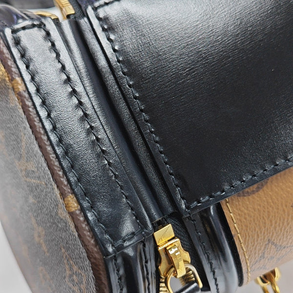 CANNES PM Monogram Coated Canvas Brown