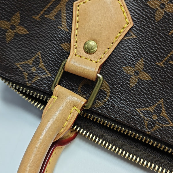 SPEEDY 25 Monogram Coated Canvas Brown
