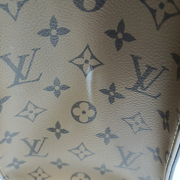 ONTHEGO MM Monogram Coated Canvas Brown