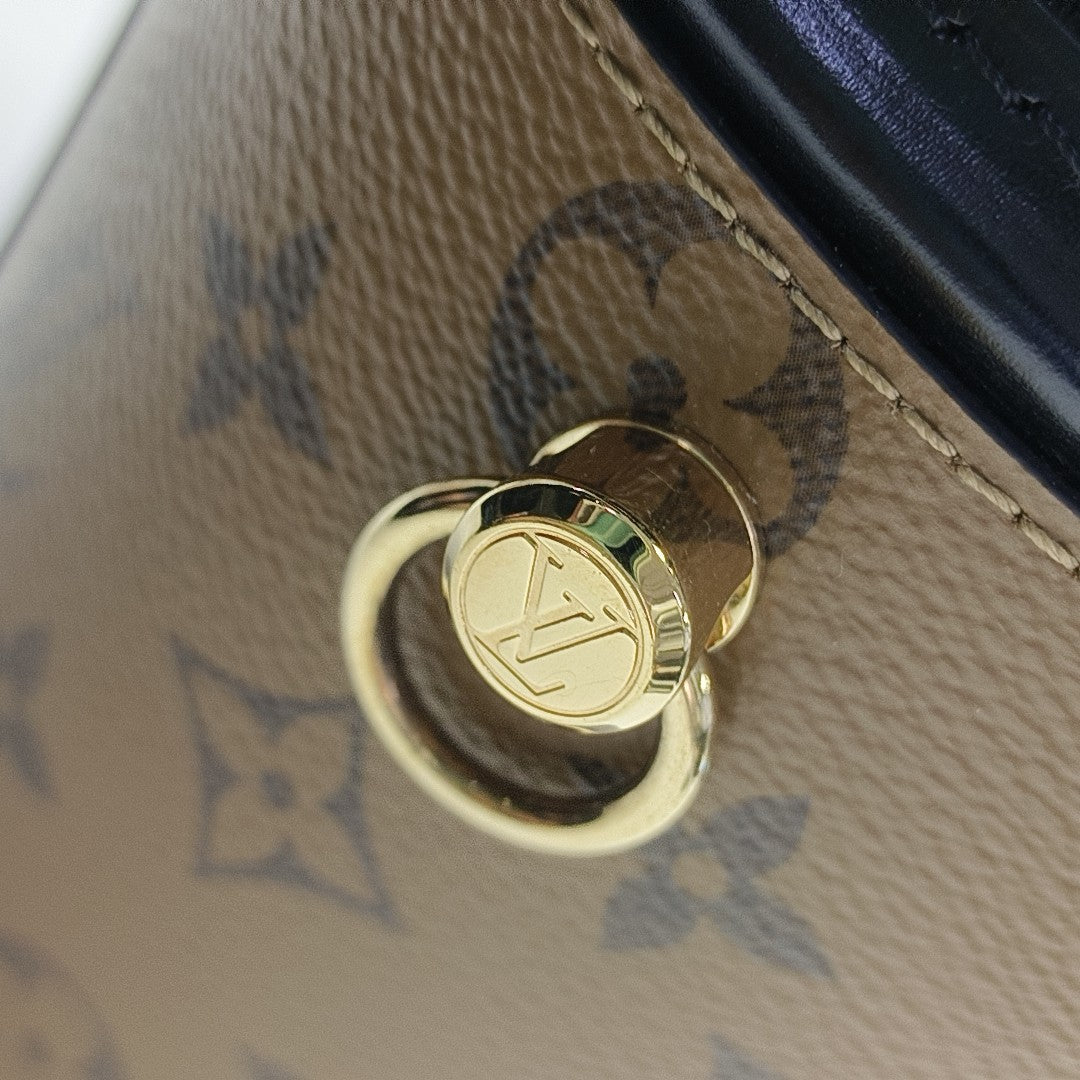 CANNES PM Monogram Coated Canvas Brown