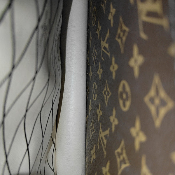 TRUNK Monogram Coated Canvas Brown