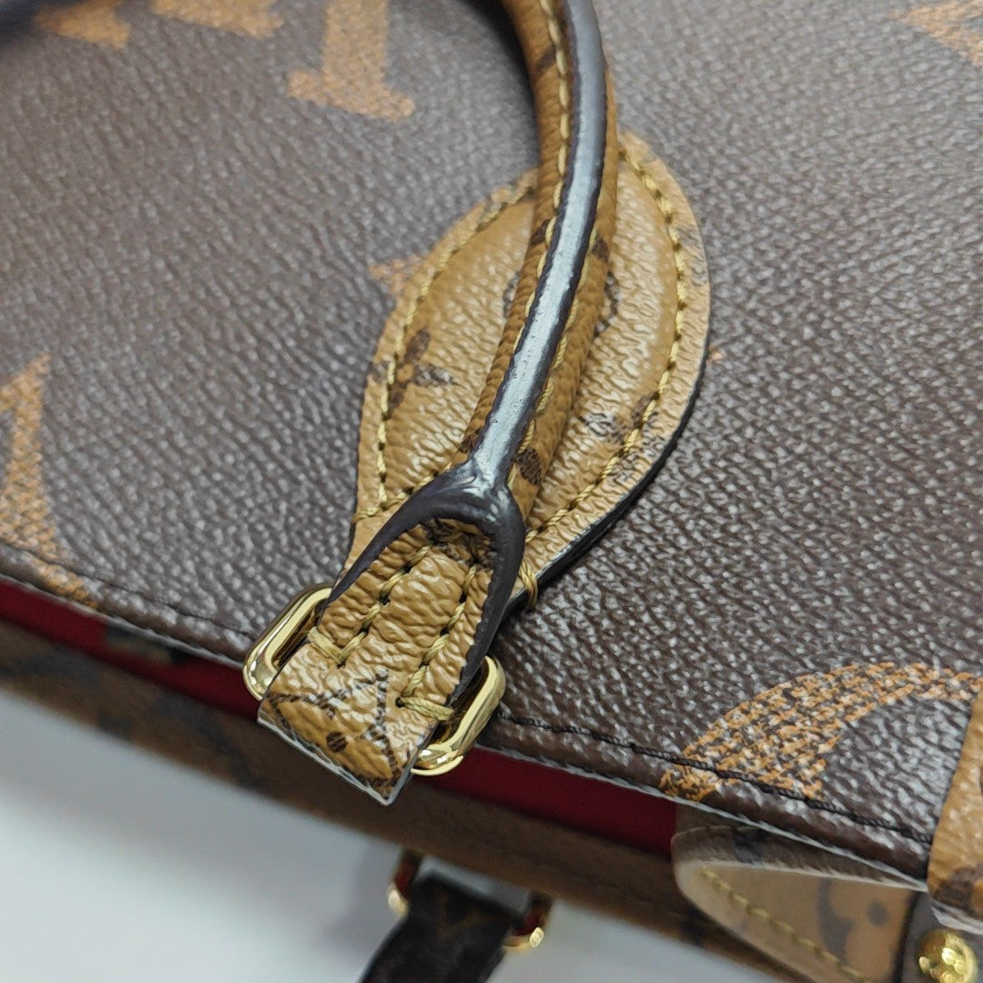 ONTHEGO PM Monogram Coated Canvas Brown
