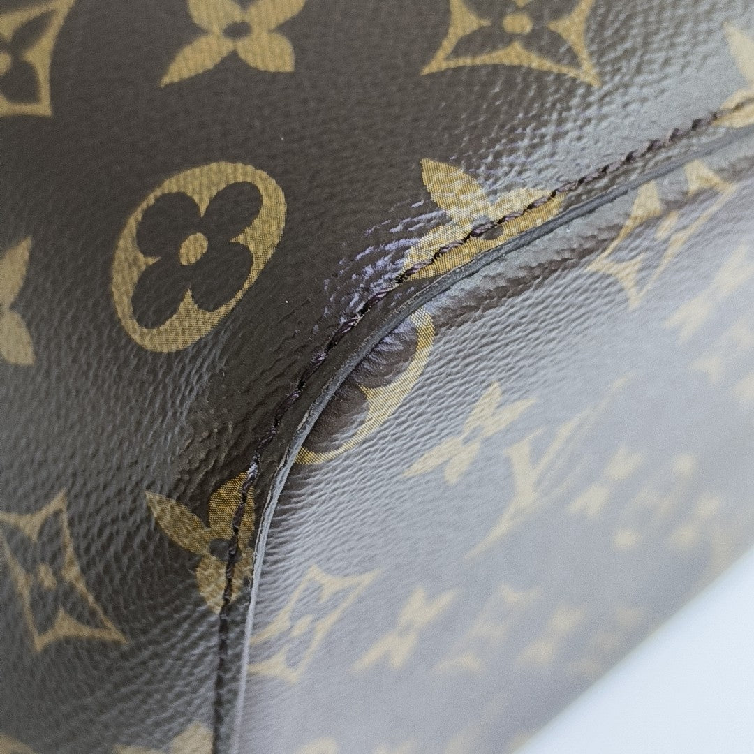 NÉONOÉ MM Monogram Coated Canvas Brown