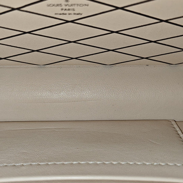 PETITE MALLE Monogram Coated Canvas Brown