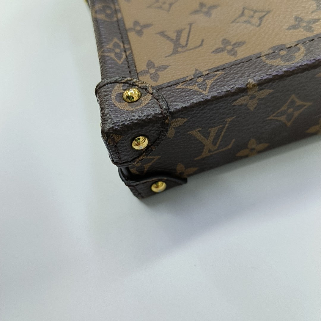 TRUNK Monogram Coated Canvas Brown