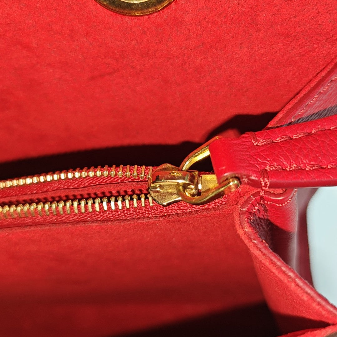 VICTOIRE Monogram Coated Canvas Brown