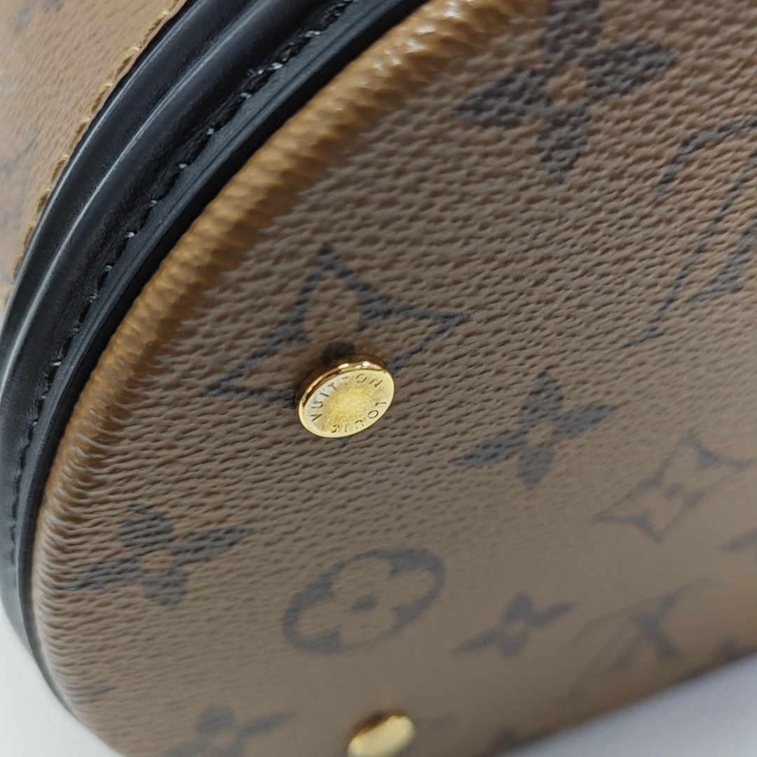 CANNES PM Monogram Coated Canvas Brown