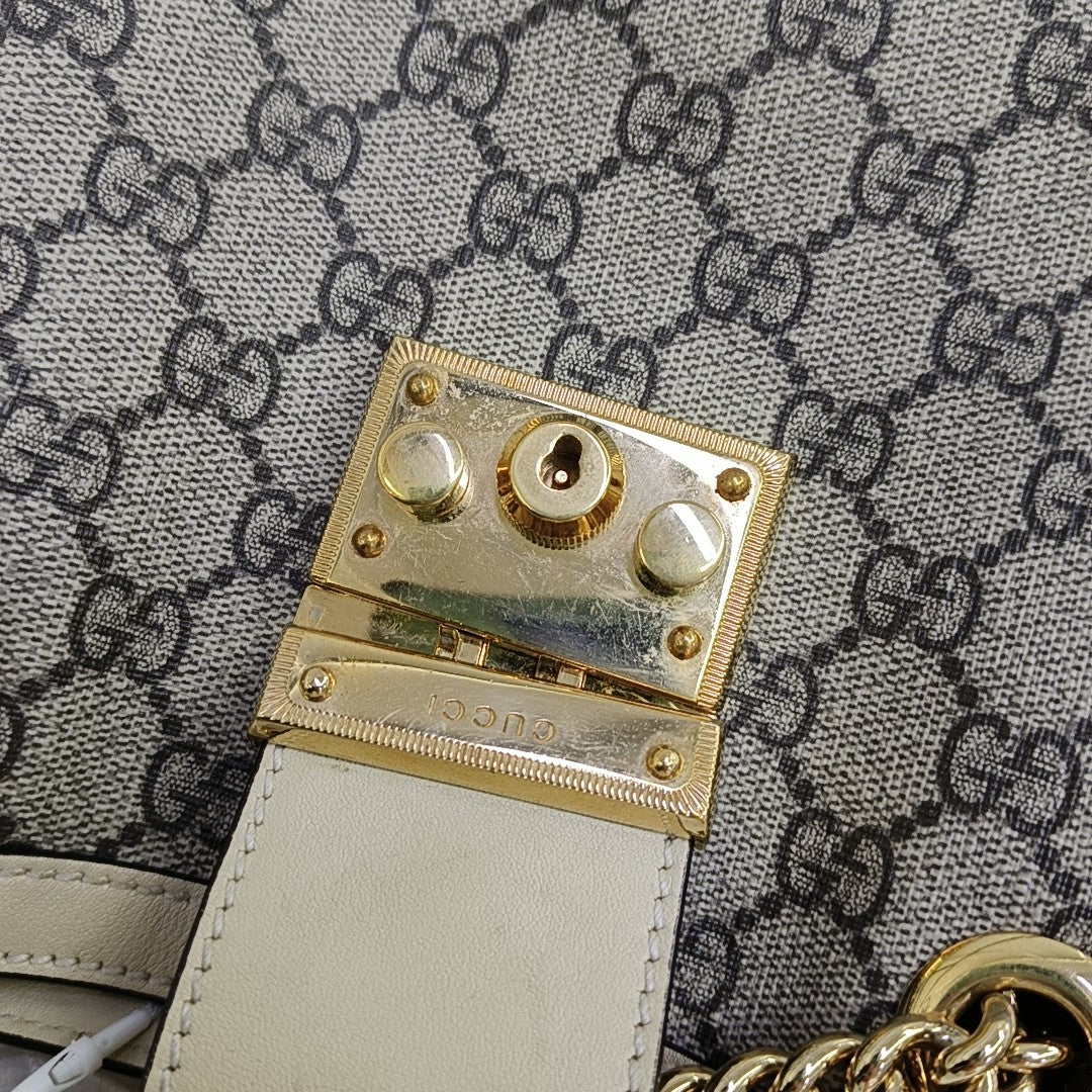Padlock Small Monogram Coated Canvas Beige