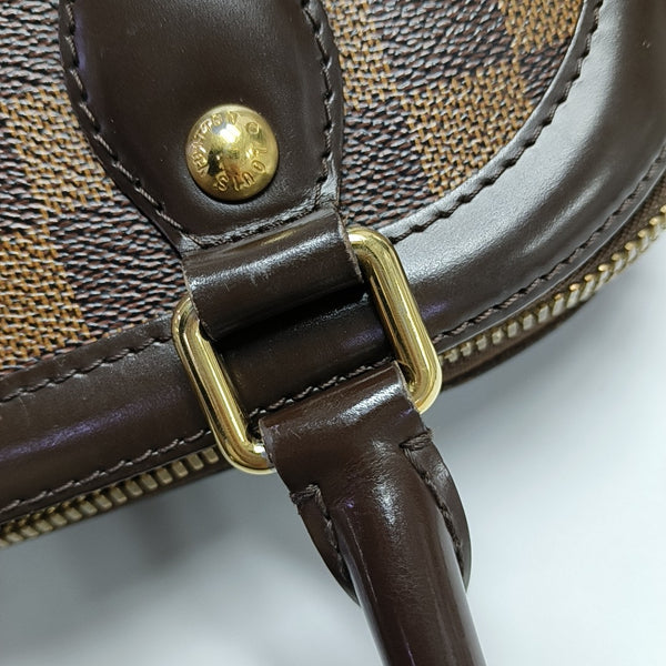 TREVI PM Damier Ebene Coated Canvas Brown