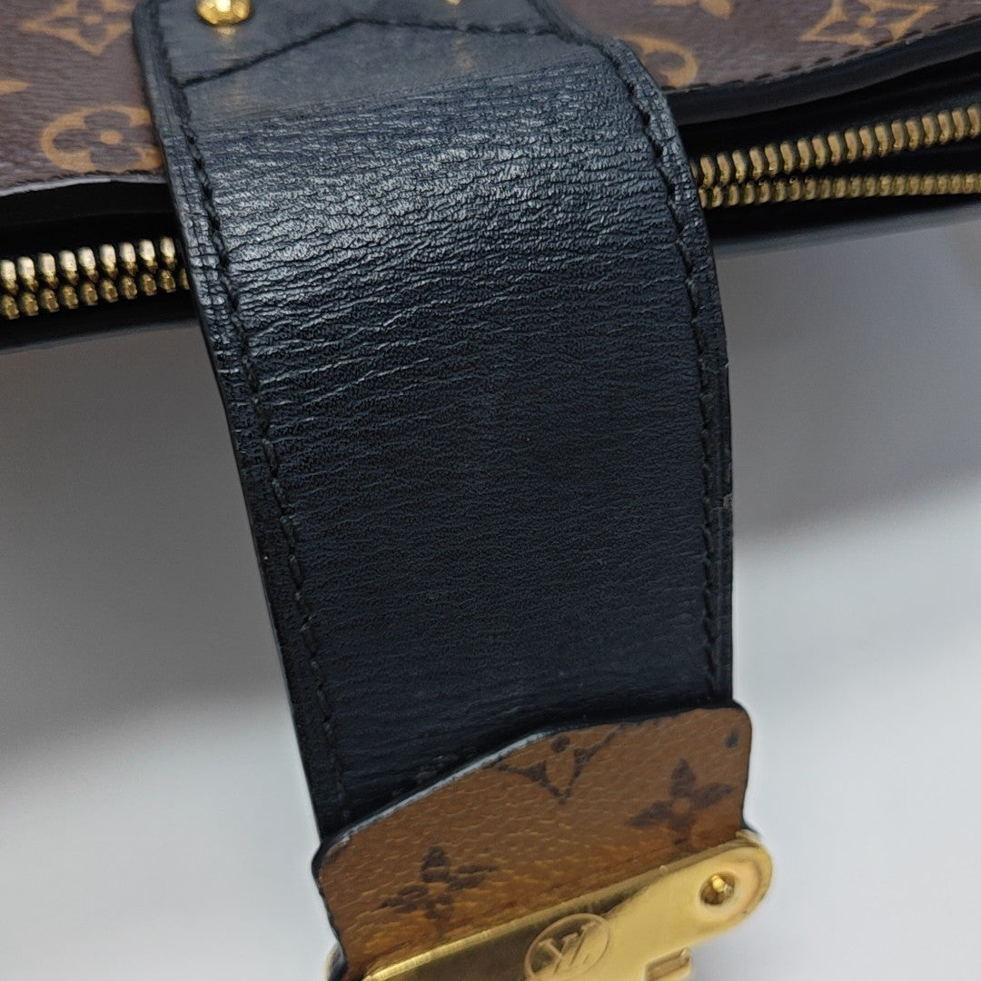 TRUNK Monogram Coated Canvas Brown