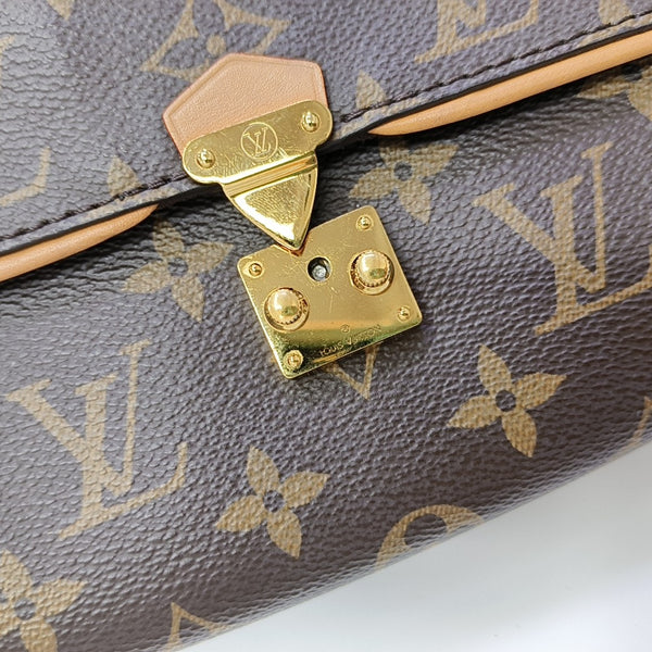 Pochette Camille Monogram Coated Canvas Brown