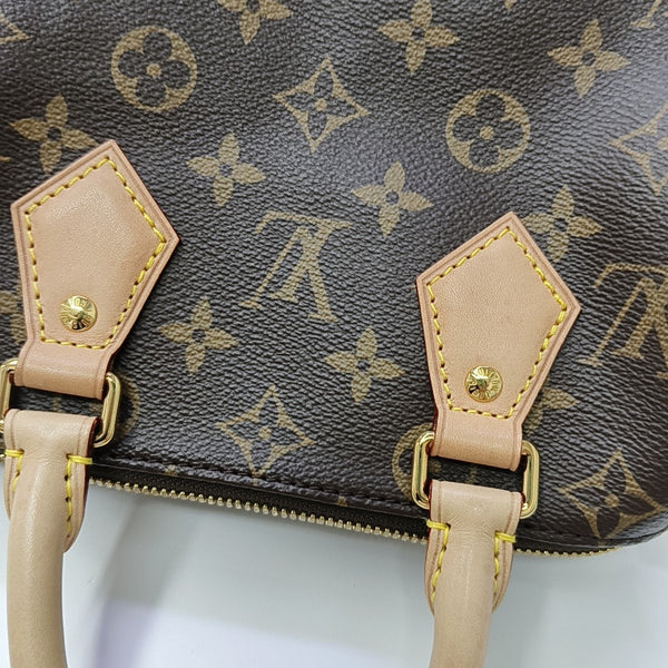 SPEEDY 20 Monogram Coated Canvas Brown