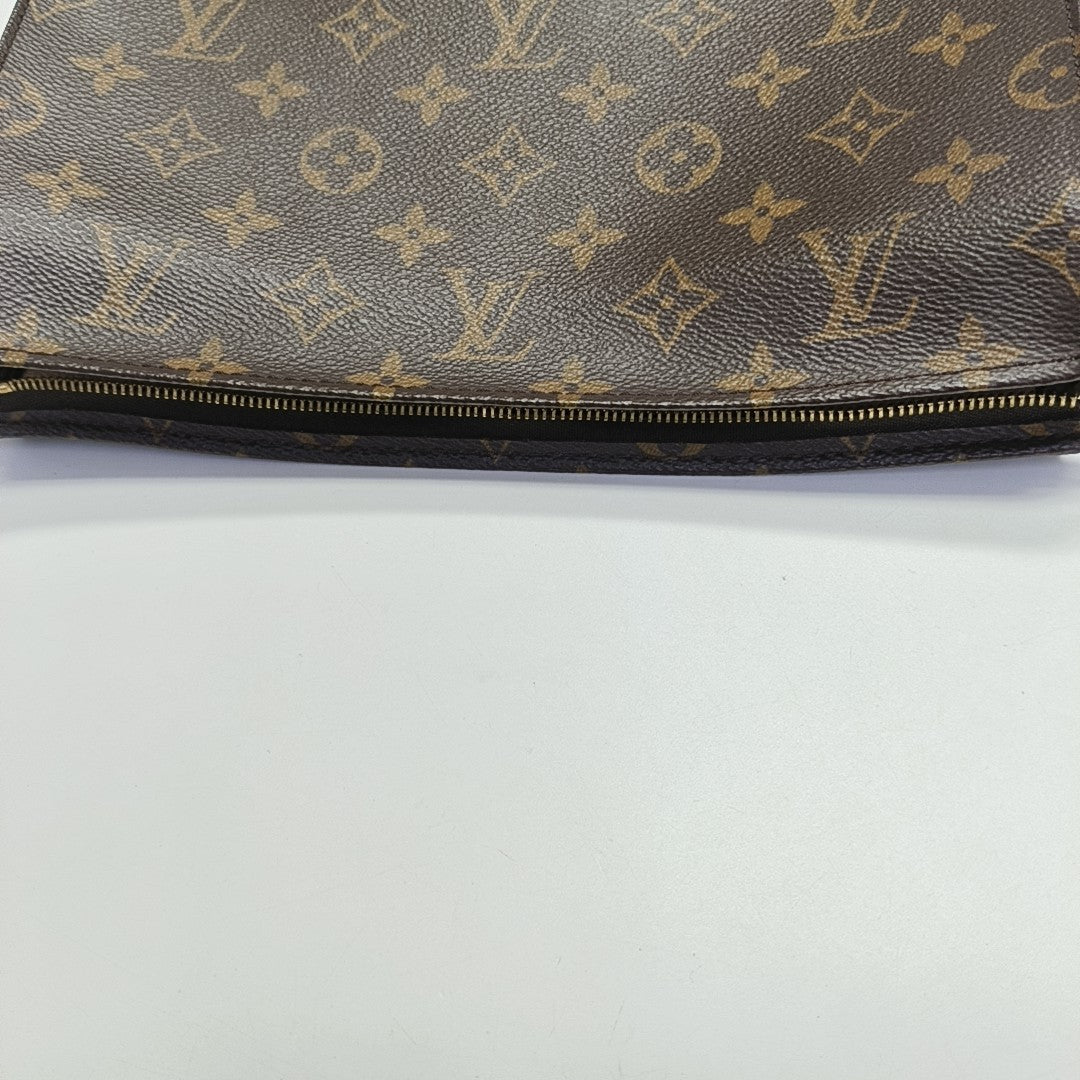 TOILET POCKET Monogram Coated Canvas Brown