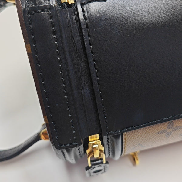 CANNES PM Monogram Coated Canvas Brown