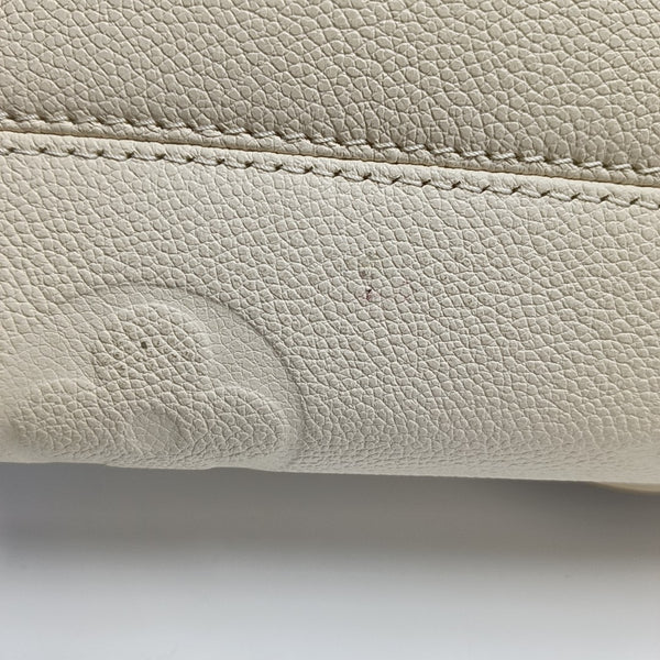 ONTHEGO EAST WEST Monogram Calfskin Beige