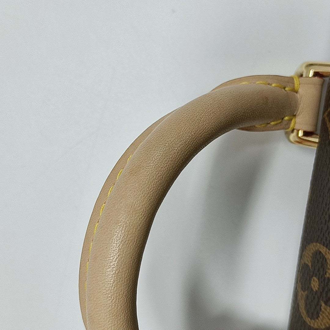MADELEINE Monogram Coated Canvas Brown