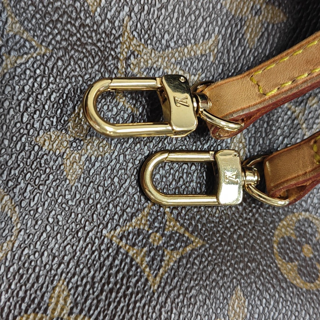 EVA Monogram Coated Canvas Brown
