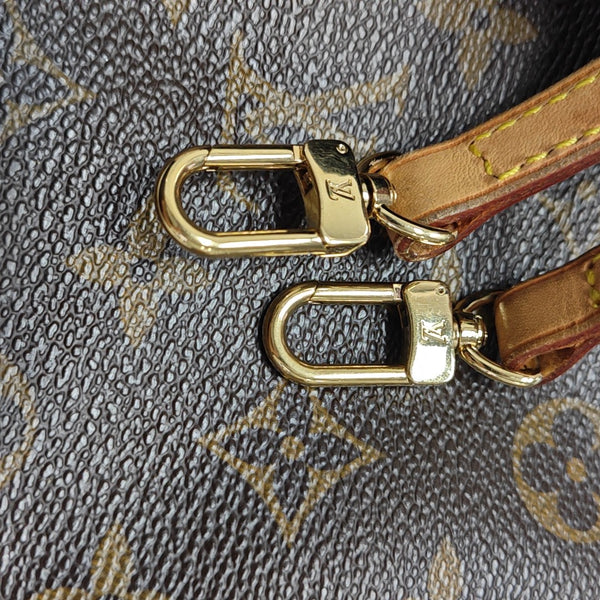 EVA Monogram Coated Canvas Brown