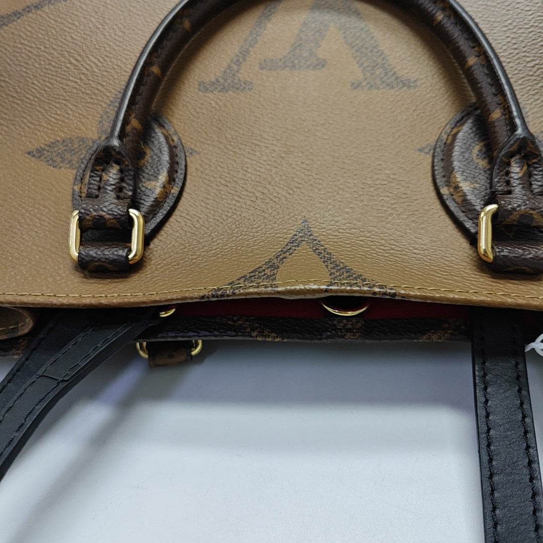 ONTHEGO MM Monogram Coated Canvas Brown