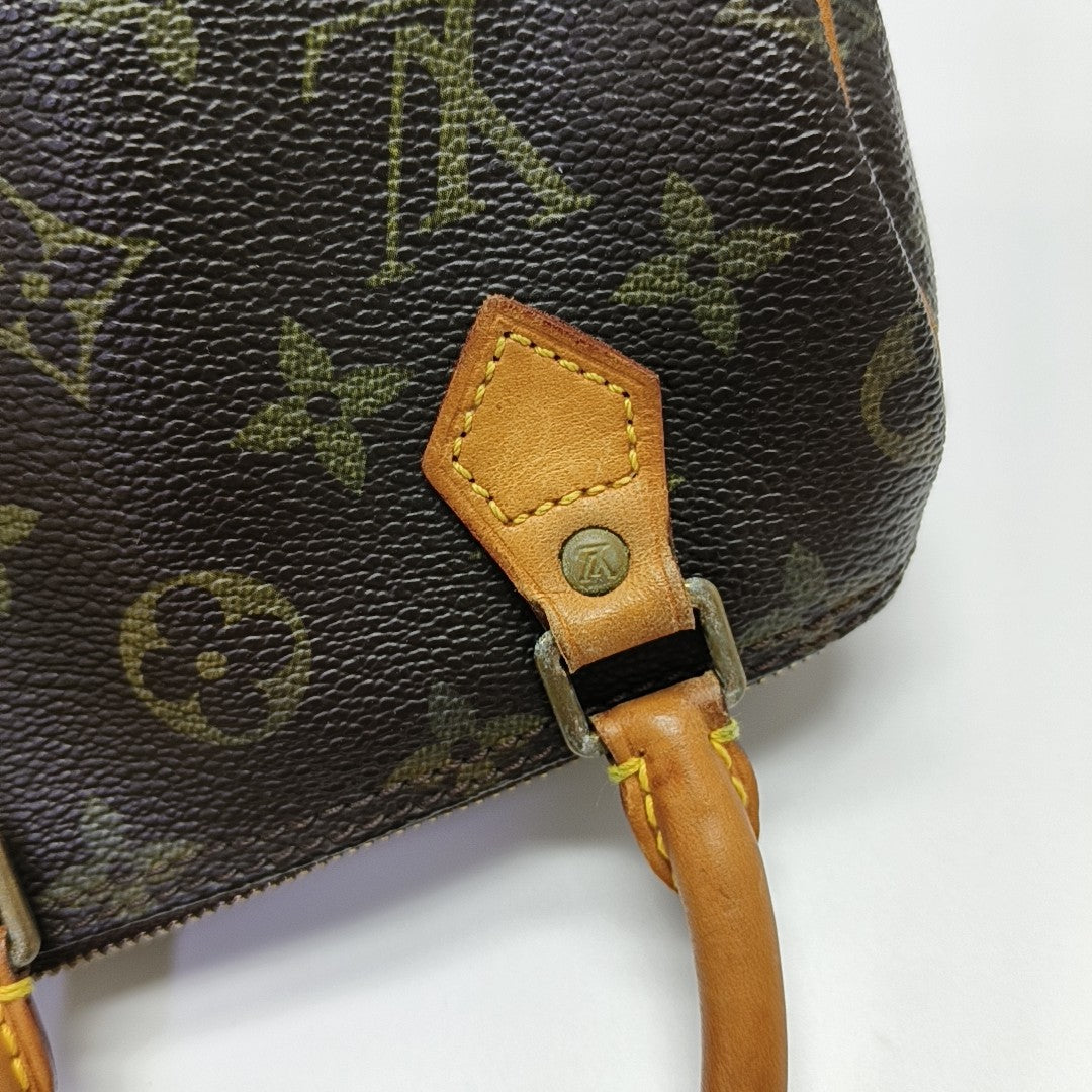 SPEEDY Monogram Coated Canvas Brown