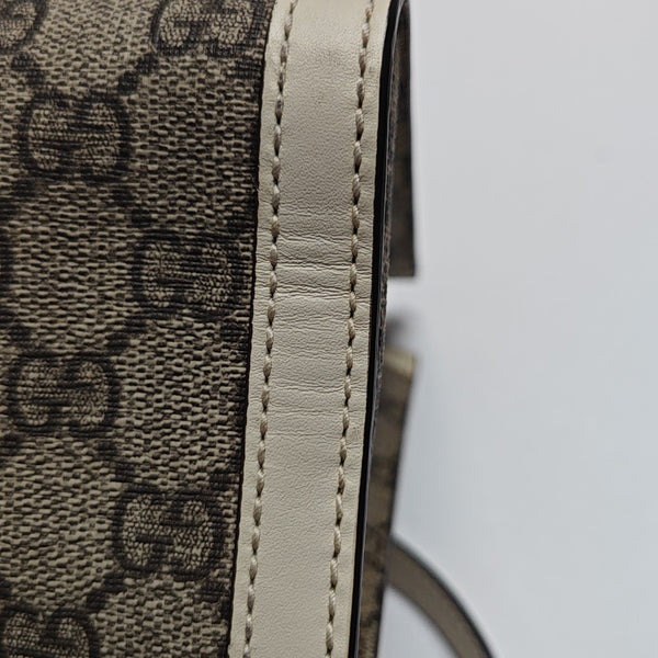 Padlock Small Monogram Coated Canvas Beige