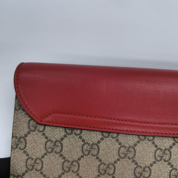 Monogram Coated Canvas Clutch Beige