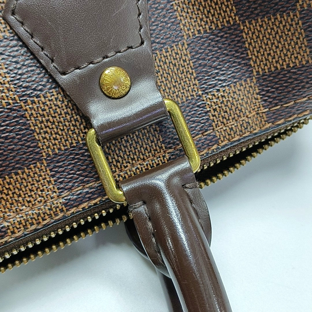 SPEEDY 25 Damier Ebene Coated Canvas Brown