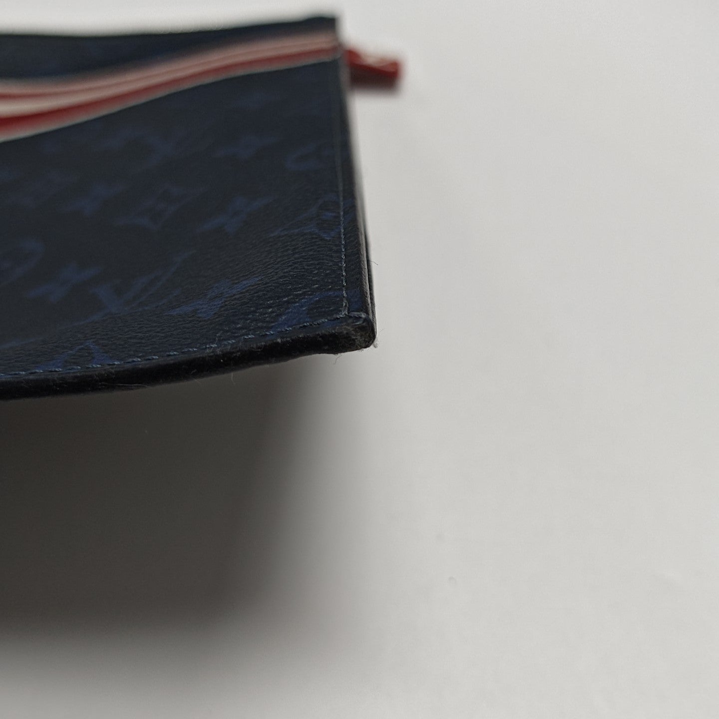 Monogram Coated Canvas Clutch Blue