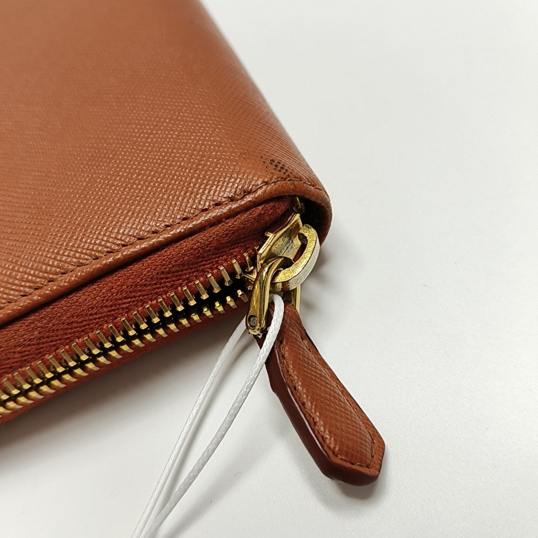 Zippy Wallet Saffiano Calfskin Orange Wallet