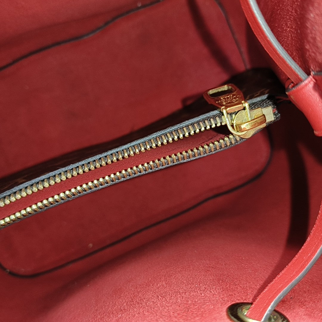 NÉONOÉ MM Monogram Coated Canvas Brown