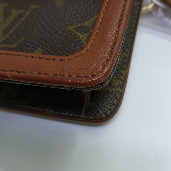 DAME Monogram Coated Canvas Brown