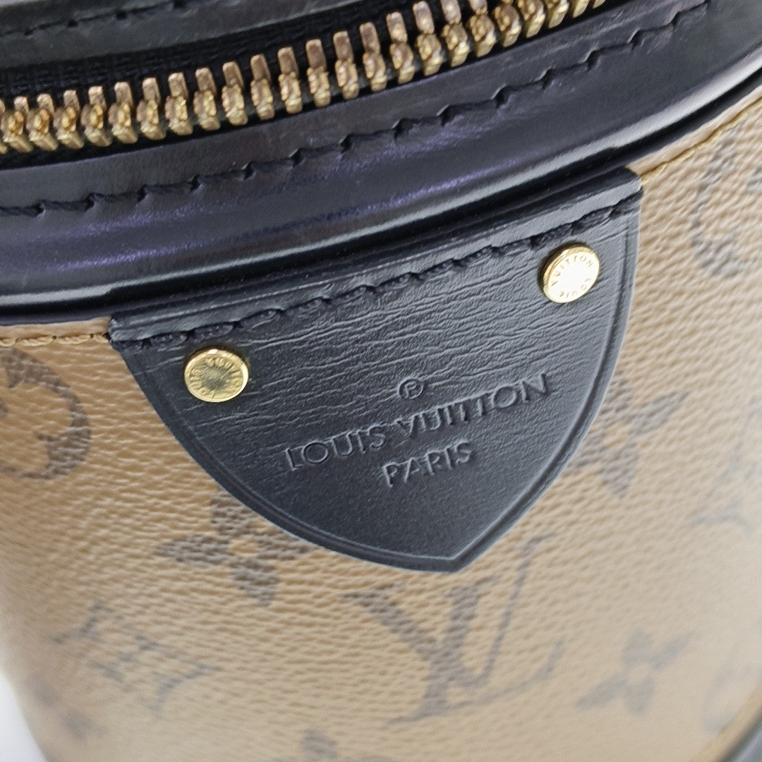 CANNES PM Monogram Coated Canvas Brown