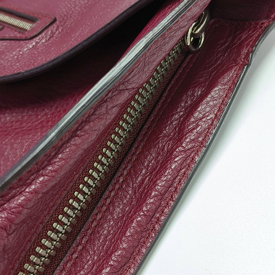 Authenticated pre-owned  Papier Calfskin Burgundy - Clutch at Looply