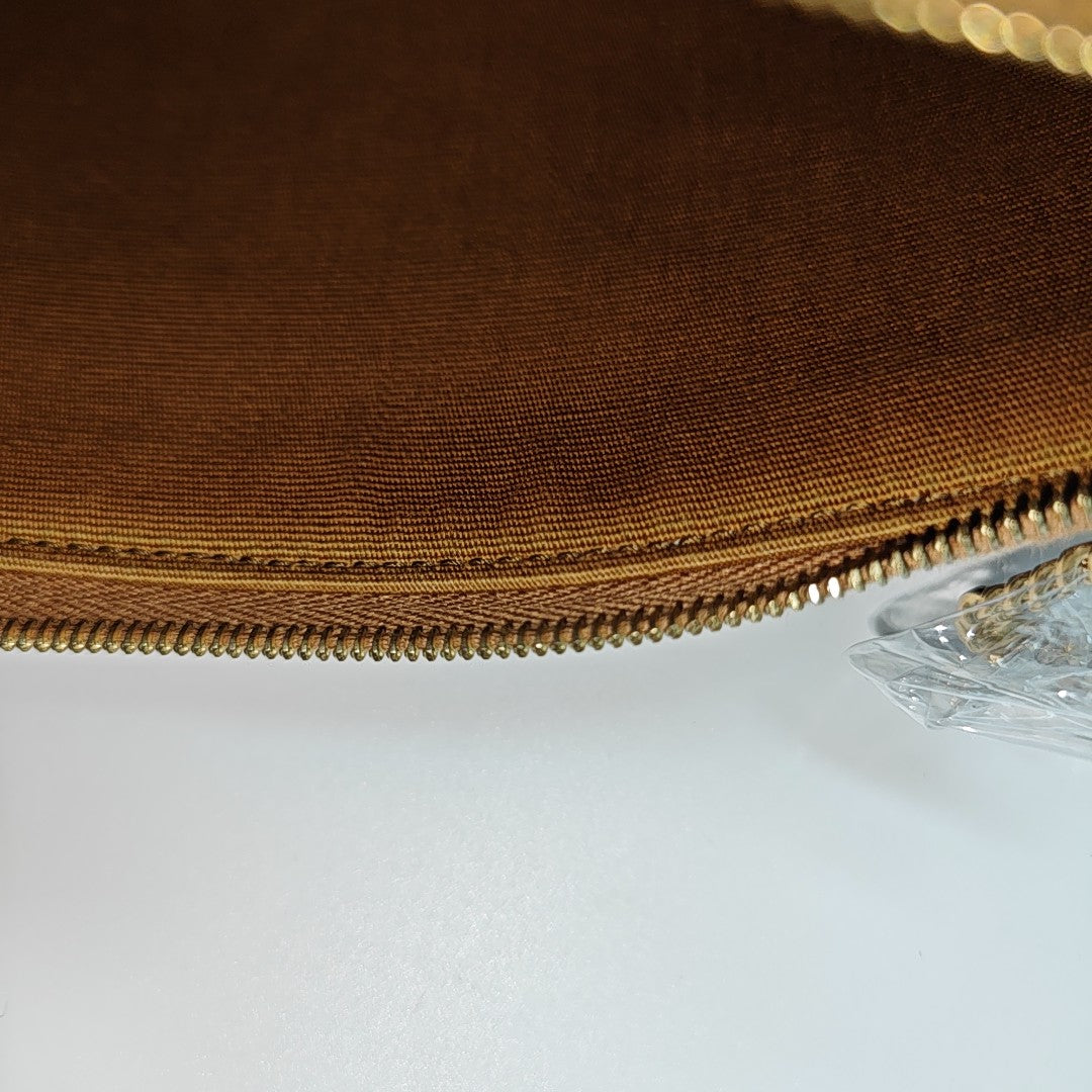 TRIOMPHE Mini Coated Canvas Brown