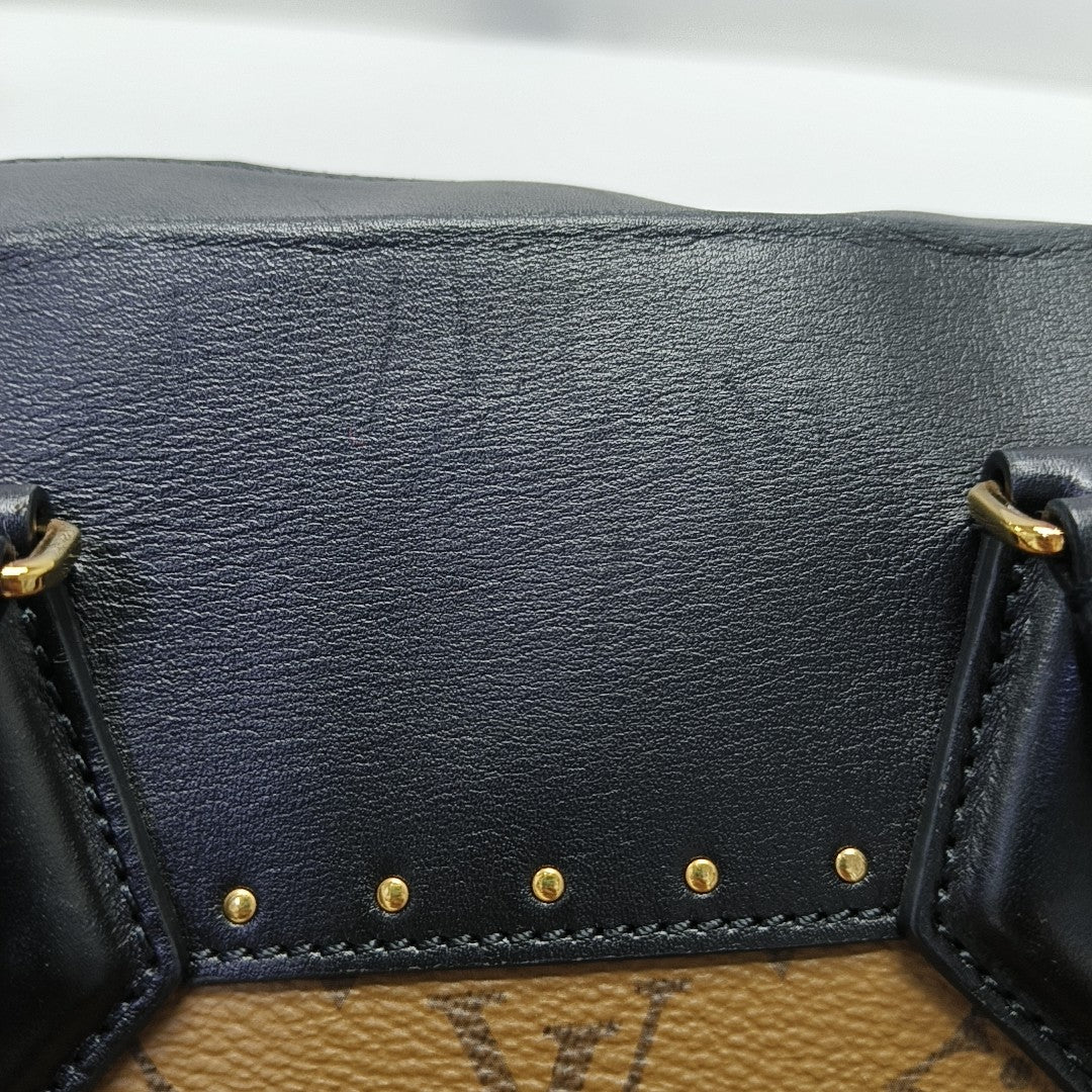 PETITE MALLE Monogram Coated Canvas Brown