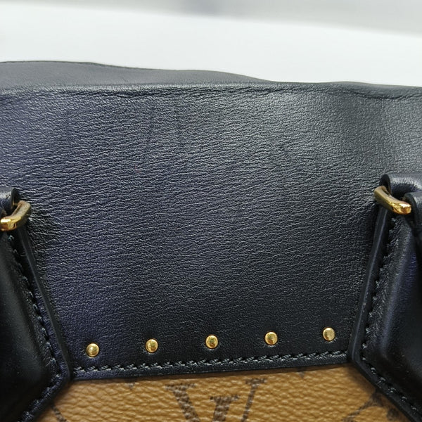 PETITE MALLE Monogram Coated Canvas Brown