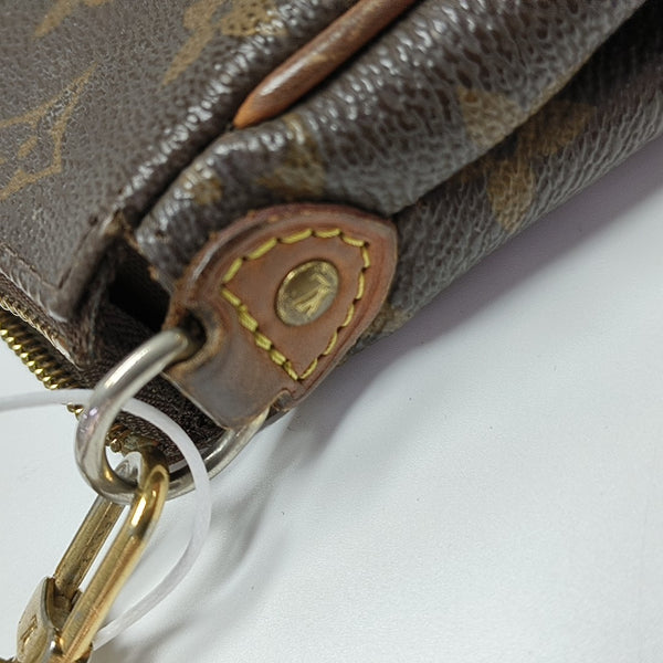 Pochette Eva Monogram Coated Canvas Brown