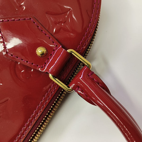 ALMA PM Piel Charol Monogram Roja