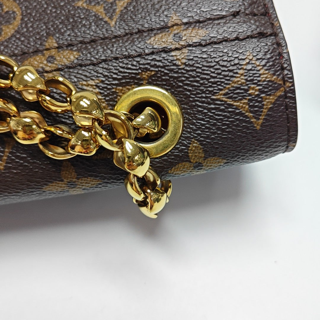 VICTOIRE Monogram Coated Canvas Brown