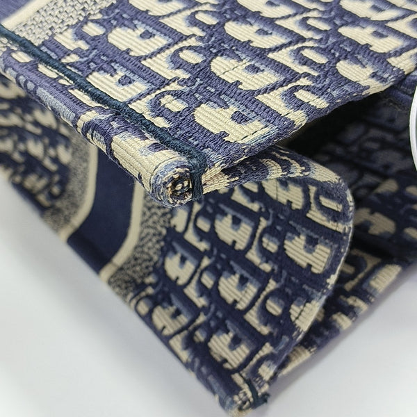 Authenticated pre-owned  Book Tote Medium Monogram Canvas Blue - Tote Bag at Looply