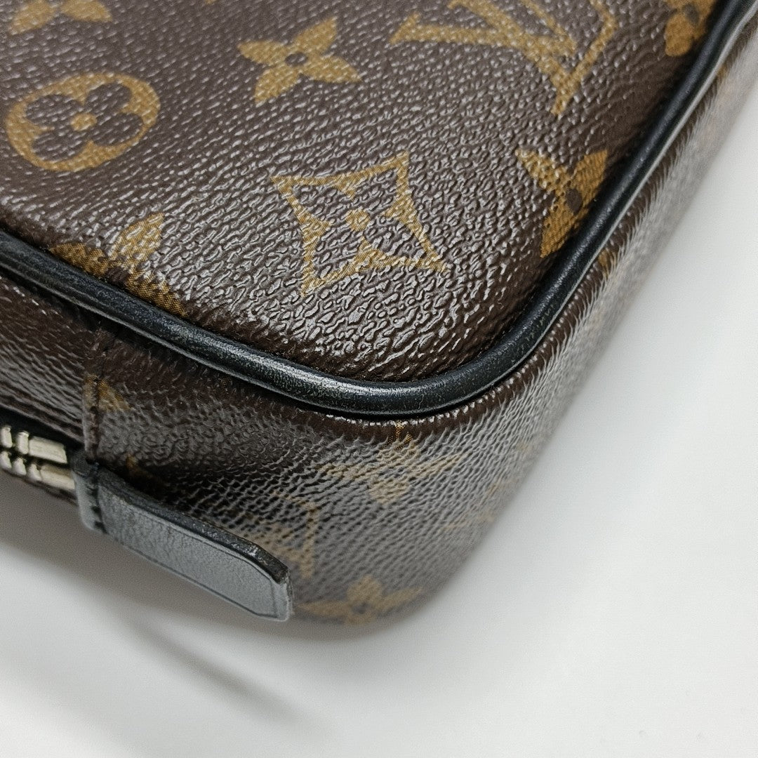 Monogram Coated Canvas Clutch PM Brown