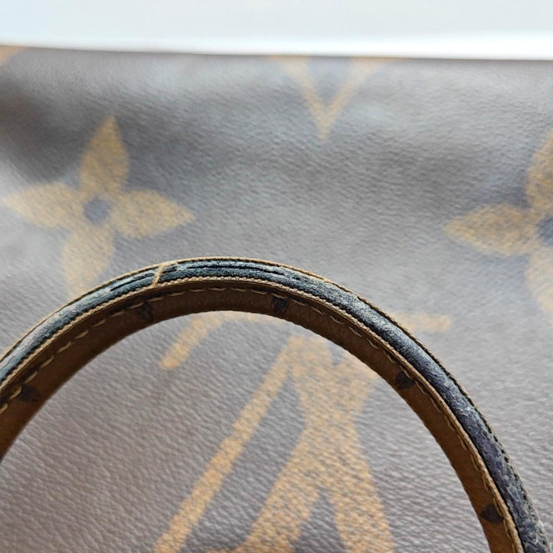 ONTHEGO MM Monogram Coated Canvas Brown