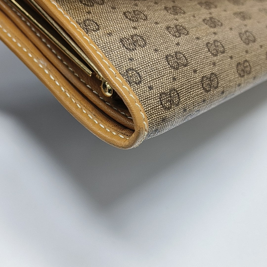 Monogram Coated Canvas Wallet Brown