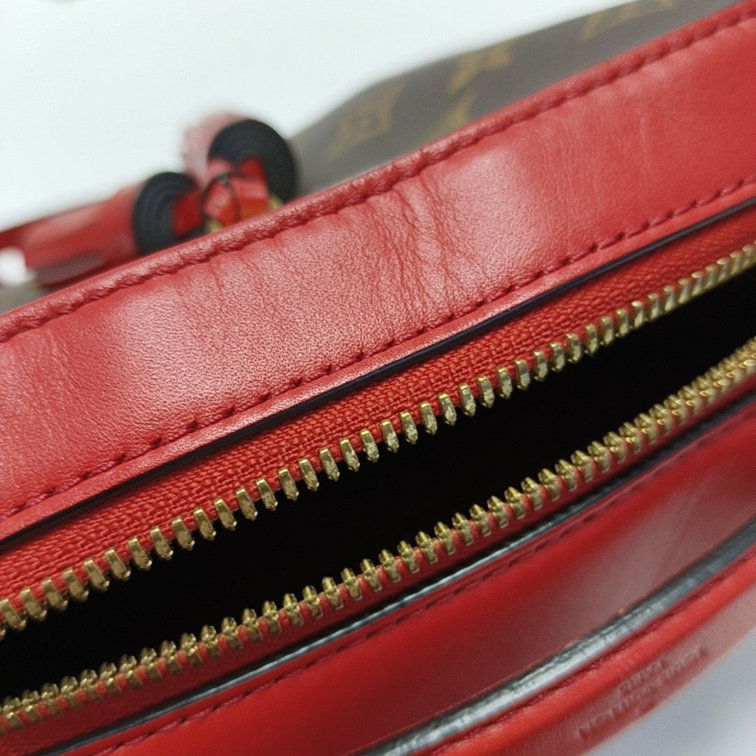 SAINTONGE Monogram Coated Canvas Brown