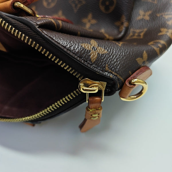 RIVOLI BB Monogram Coated Canvas Brown